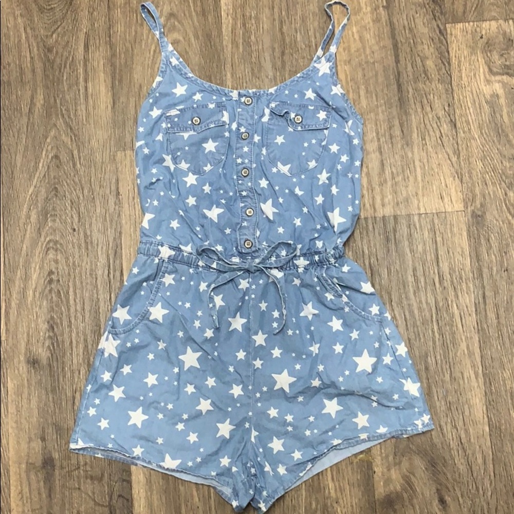 Blue romper with stars.